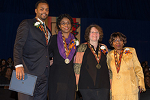 This year's Unsung Heroes are honored during the Martin Luther King Jr. Celebration at the Carrier Dome on Sunday, Jan. 19. They are, from left: Joseph, Deborah Person, Georgia Popoff and Dorothy Russell.