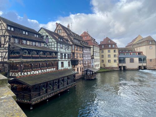 A view from the Ill River of Tudor style buildings in Strasbourg.