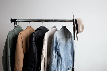 A garment rack filled with fall jackets.