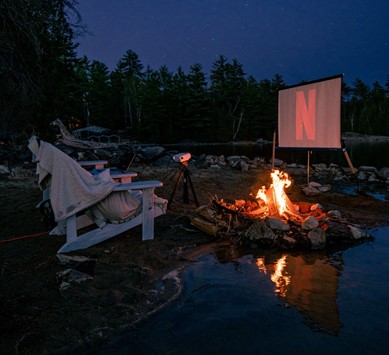 An outdoor Netflix screening by the fire.