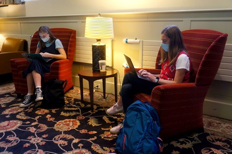 Two students study in the Hendricks Chapel Noble Room