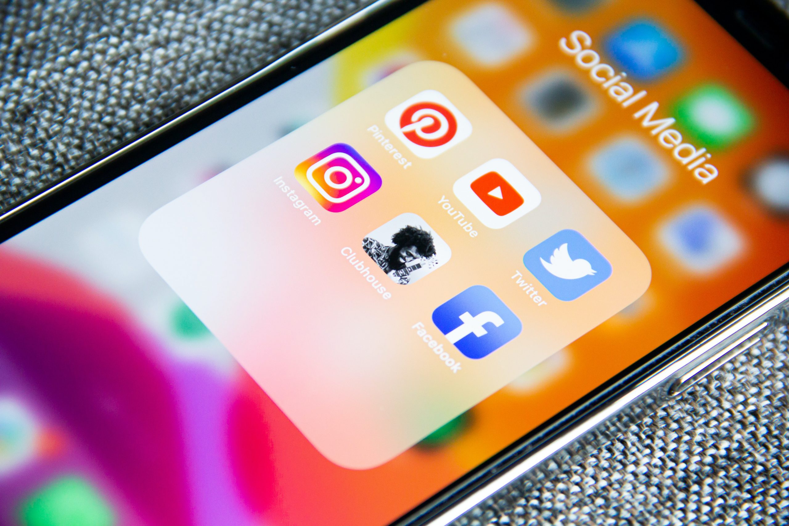 An iPhone screen with different social media app icons visible