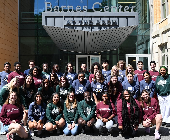 The 2022-2023 Peer Educators stand together for a group photo outside the Barnes Center