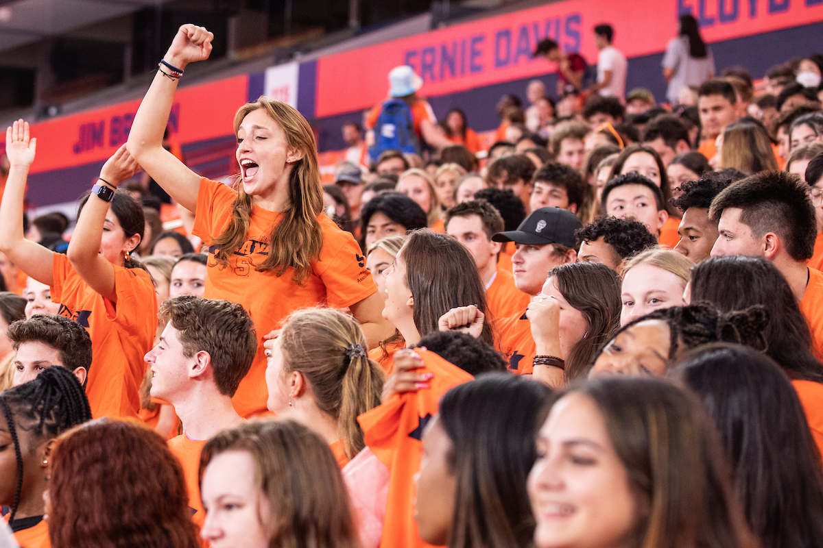 Students cheer in the stands at The Dome.