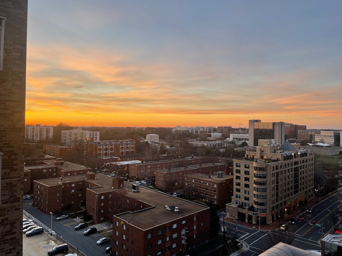 A sunset over a city street.