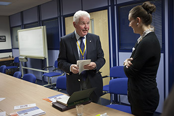 Cara Howe, right, assistant archivist for the Pan Am 103/Lockerbie Air Disaster Archives at Syracuse University, speaks to retired Chief Constable John Boyd at Cornwall Mount, Police Scotland headquarters in Dumfries. Boyd contributed an oral history earlier this month to the “Telling the Stories” Pan Am 103 Story Archive Project.