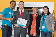 Daniel Goldberg, second from left, received $5,000 in the RvD IDEA Awards. From left are Tony Kershaw, program coordinator for entrepreneurship and innovation in the iSchool; Goldberg; Gisela von Dran; and Stacey Keefe, IDEA director. 