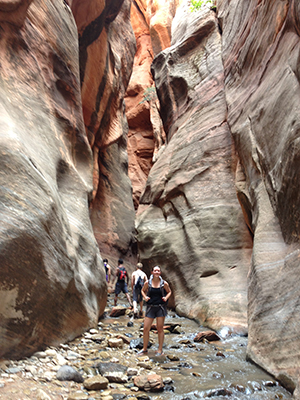 Meagan Pepper, graduate student in the School of Education, hikes at Kanaraville Falls in Utah.