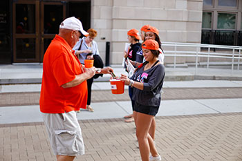 Students collect donations from fans outside the Carrier Dome on last year's Dollar Day at the Dome.