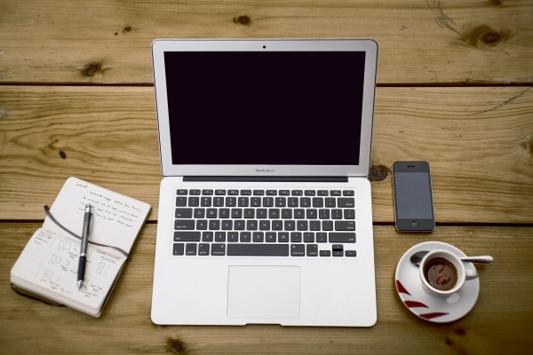 computer and cup of coffee