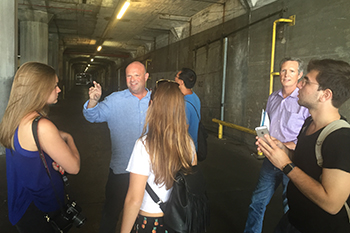 Sherman and Syracuse Architecture students visit a warehouse at the Port of Los Angeles.