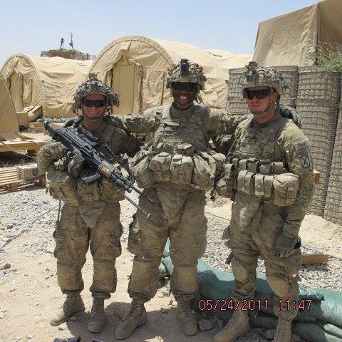 three men in military gear