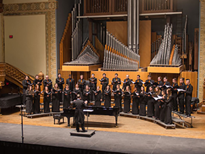 The University Singers performing in Setnor Auditorium