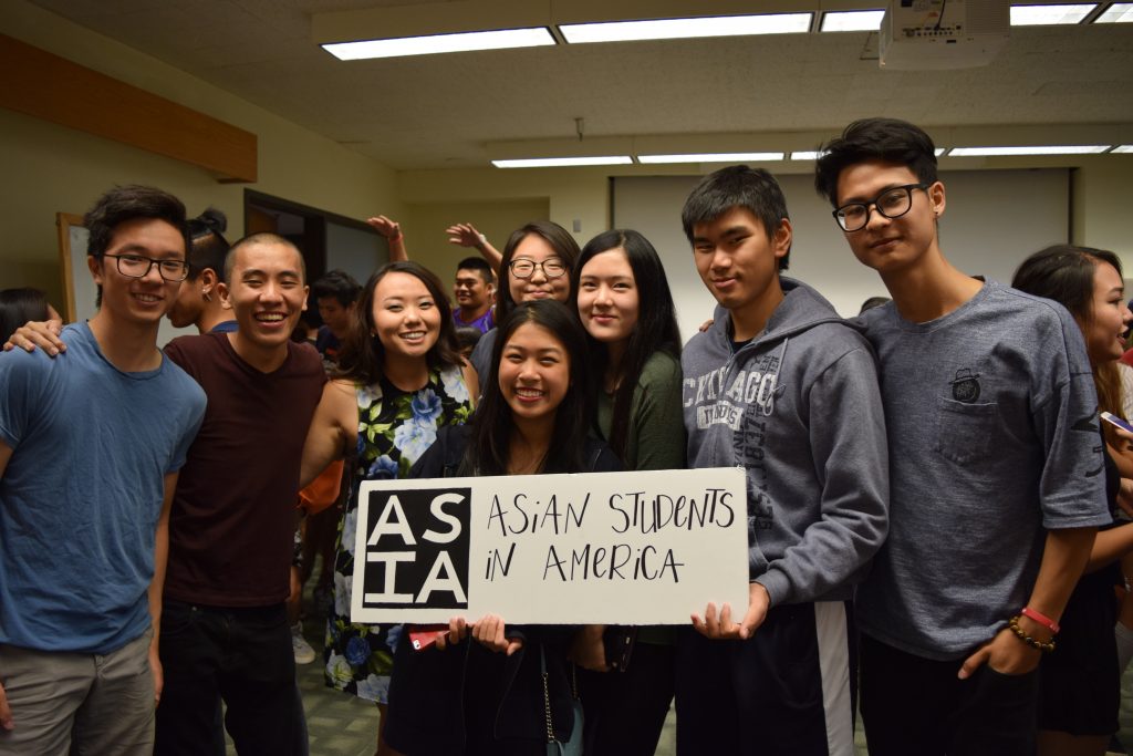 students holding sign