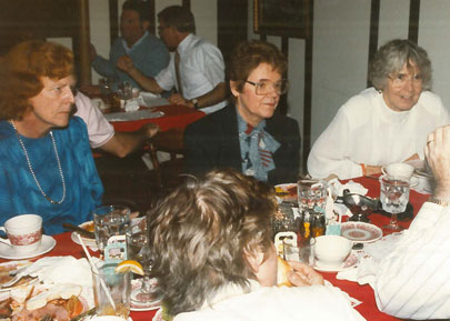 three women at table
