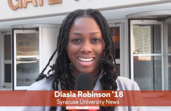 Cuse Cast anchor Diasia Robinson standing in front of the Carrier Dome