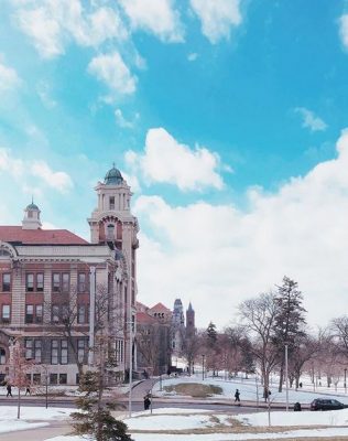 campus building with snow on ground