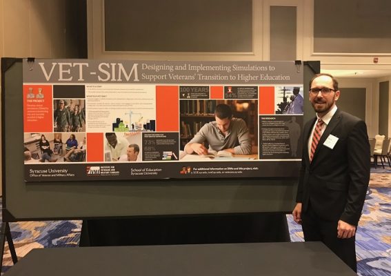 man standing in front of poster
