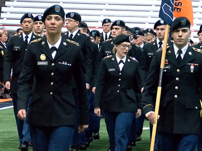 ROTC members marching in the Carrier Dome