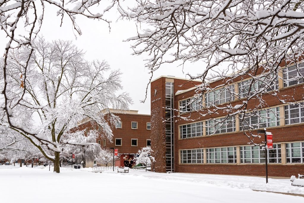 snow covered campus and trees