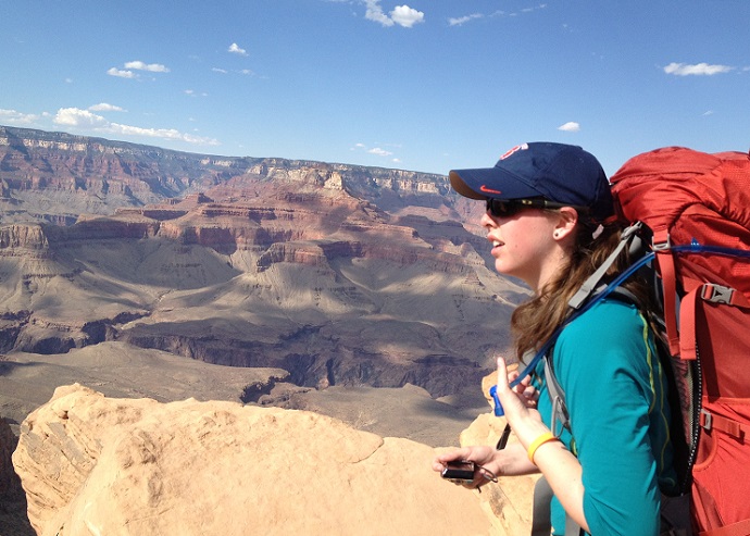 woman looking out over Grand Canyon