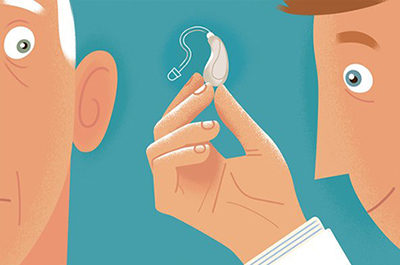 younger man holding up hearing aid to older man