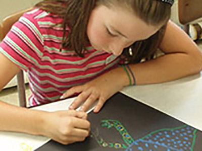 Young student drawing