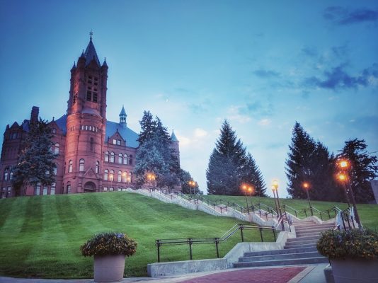 sunset over college buildings