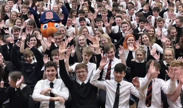 students cheering with Otto