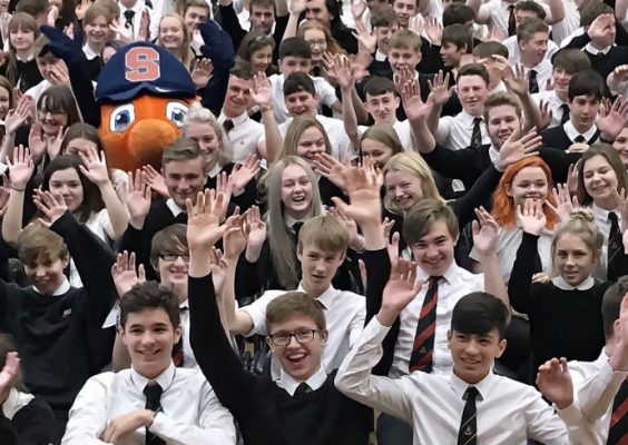students cheering with Otto