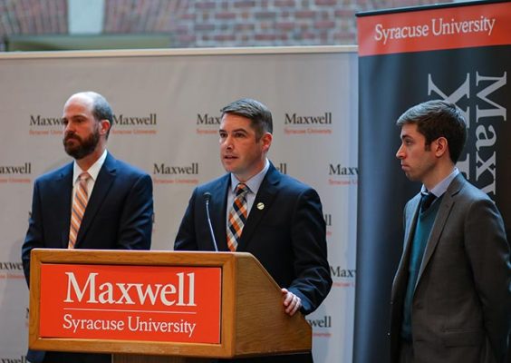 At a Nov. 13 news conference at the Maxwell School, Syracuse Mayor Ben Walsh discussed the positive outcomes of the work done by the Maxwell X Lab. He is flanked by Len Lopoo (left), Maxwell X Lab co-founder and director, and Joe Boskovski M.P.A.’14, the lab’s co-founder and managing director.