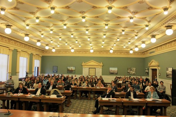 Audience for the 20th Stone Policy Symposium in the Onondaga Count Legislature chambers.