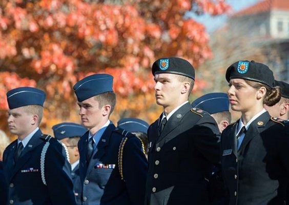 people in uniform standing in a row