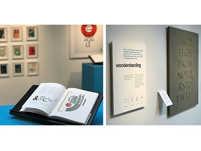 book open in exhibition and wall exhibition plaque