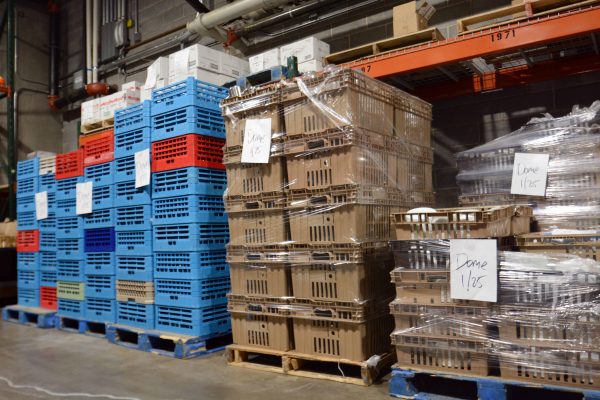 Pallets of prepared food waiting at the Commissary for delivery to the Dome. (Photo by Keone Weigl)