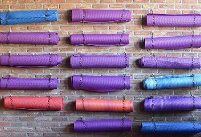 yoga mats on wall