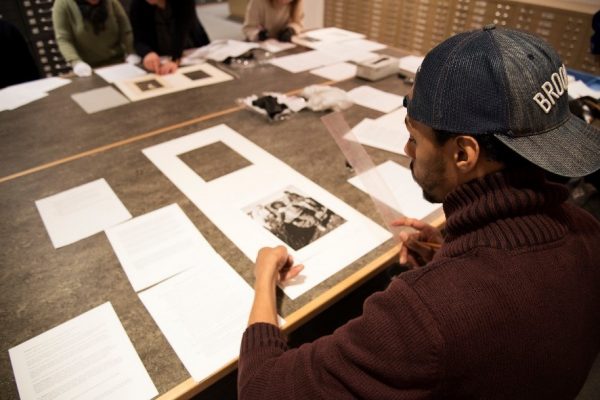 man looking at photo