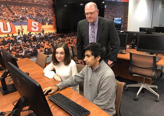 Professor Rodney Paul with students in the Milton Conrad Sport Technlogy Lab.