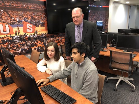 Professor Rodney Paul with students in the Milton Conrad Sport Technlogy Lab