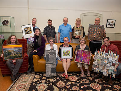Winning artists and their works from the 2018 On My Own Time exhibition.