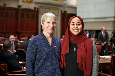 Marshall Scholar Dina Eldawy (right) with New York State Sen. Rachel May at the Senate chambers in Albany. 