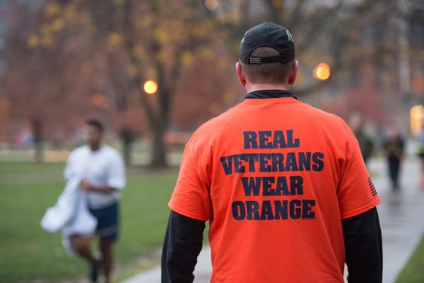 student wearing Real Veterans Wear Orange T-shirt