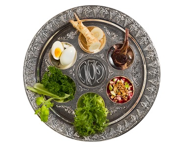 silver plate with various types of food