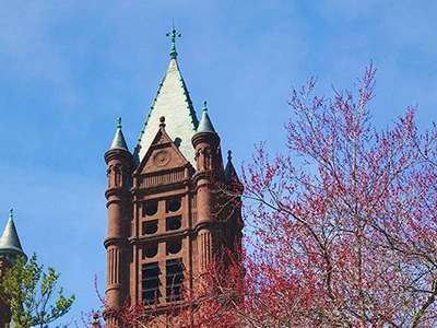 Crouse College spires with trees in front
