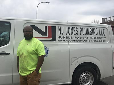 NaDonte Jones with service truck