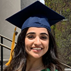 Young woman wearing mortarboard hat