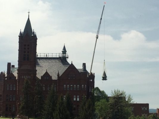 crane lifting cupola at Crouse College