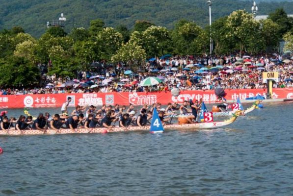 dragon boats in water at race
