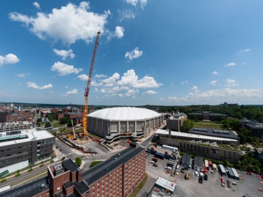 large crane working over stadium