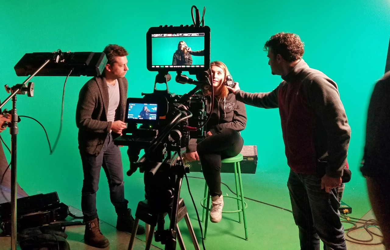 Students working in a film studio